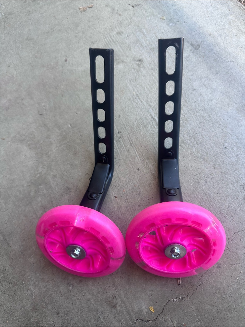 Pink Training Wheels with Black Mounts-Hardware Missing- ***Wheels light up***